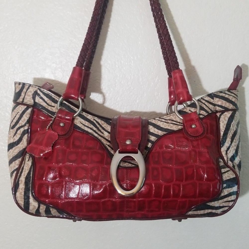 Marc Chantal Leather Embossed purse.